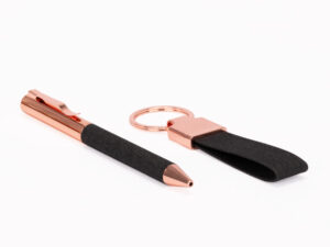 Set de regalo mine negro con detalles encobrizados.